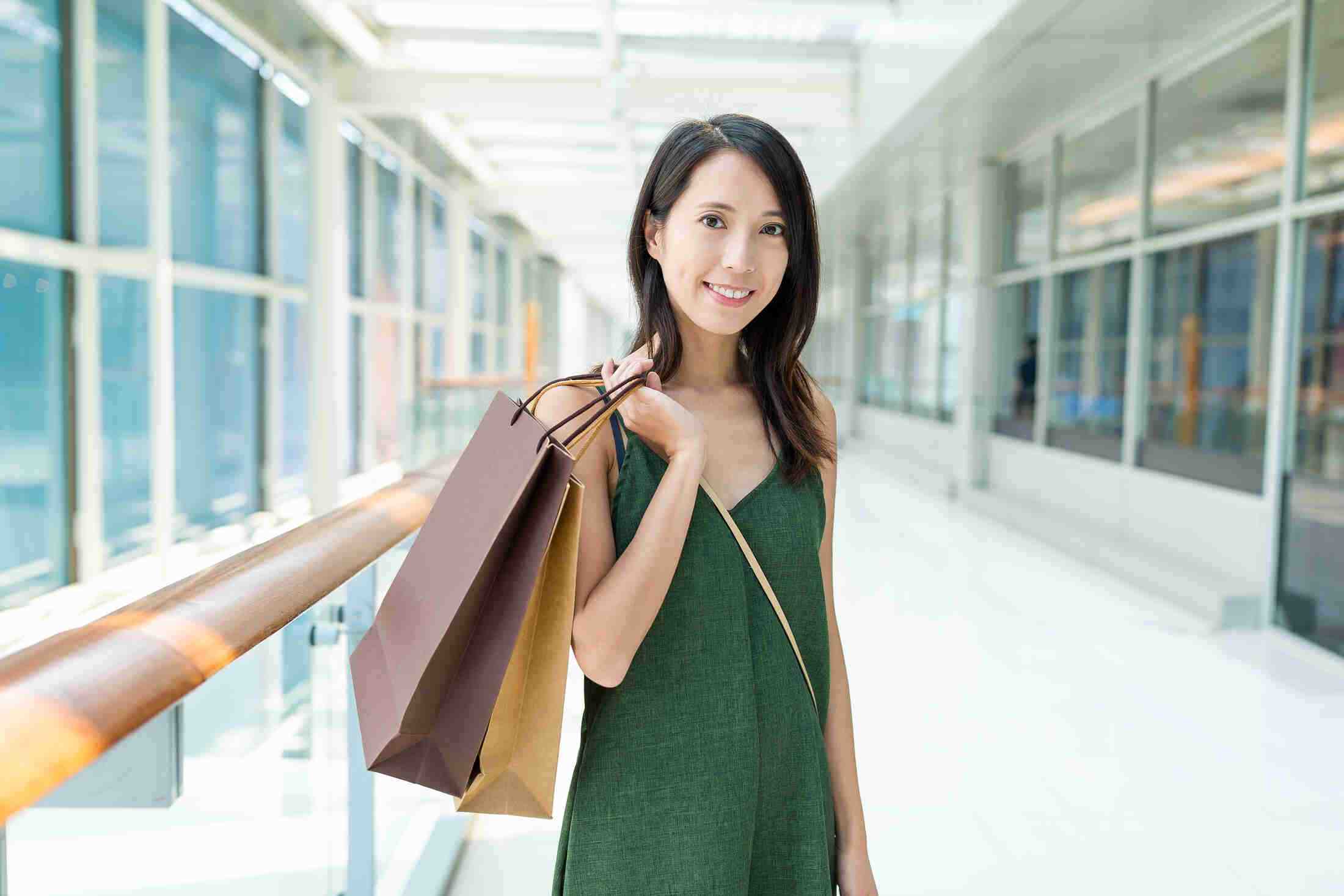 Woman holding with shopping bag 2023 11 27 05 16 12 utc 1